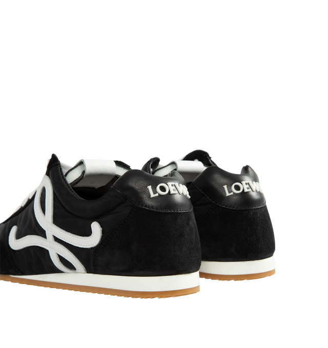 Image 3 of 5 - BLACK - Loewe Men's Ballet Runner 2.0 Sneakers are crafted from nylon and suede and feature the brand's signature asymmetrical toe shape, a sock-like internal construction, and a lightweight rubber outsole that extends over the toe. Designed for comfort and everyday versatility, this updated runner silhouette is finished with an L monogram at the side, an embossed Anagram logo on the tongue, and injected rubber LOEWE branding at the heel tab. Main Material: Nylon and Suede. Heel Height: 2 cm  
