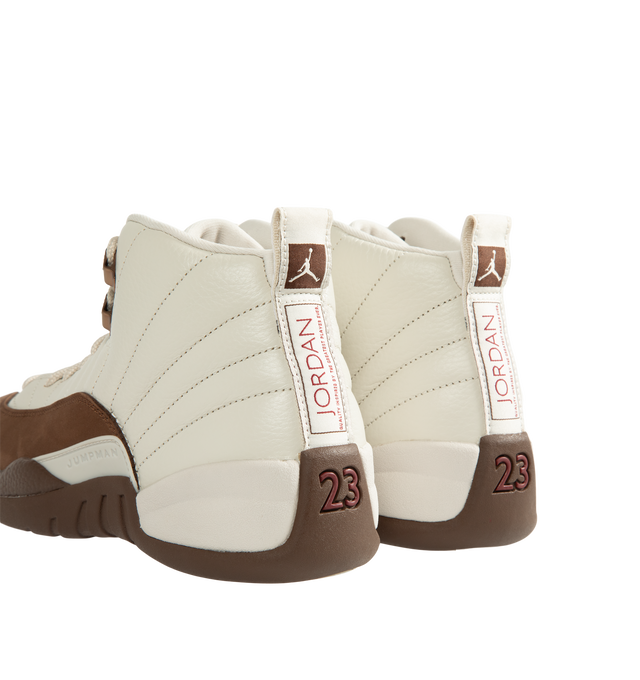 Image 3 of 5 - BROWN - Air Jordan 12 Retro "Fireside" Men's Shoes feature the iconic AJ12 silhouette in a seasonal colorway inspired by cozy autumn evenings. Crafted with a premium leather upper, this heritage basketball style combines Light Orewood Brown and Cacao Wow tones with the signature radial stitch detailing that pays homage to the original design worn by Michael Jordan. Full-length Air Zoom cushioning delivers responsive comfort, while a durable rubber outsole provides reliable traction for ever 