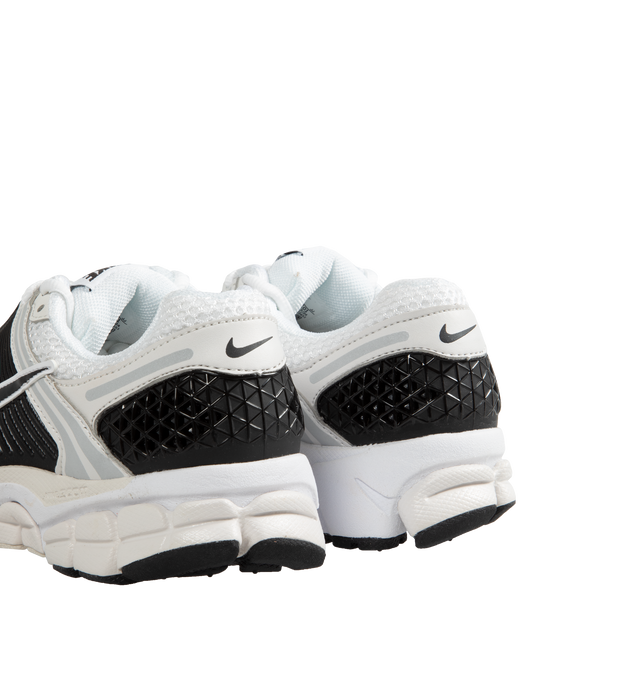 Image 3 of 5 - WHITE - NIKE ZOOM VOMERO 5 fearures Mesh with TecTuff and utilitarian overlays that are breathable and durable, cushlon foam with Zoom Air cushioning and rubber tread. 