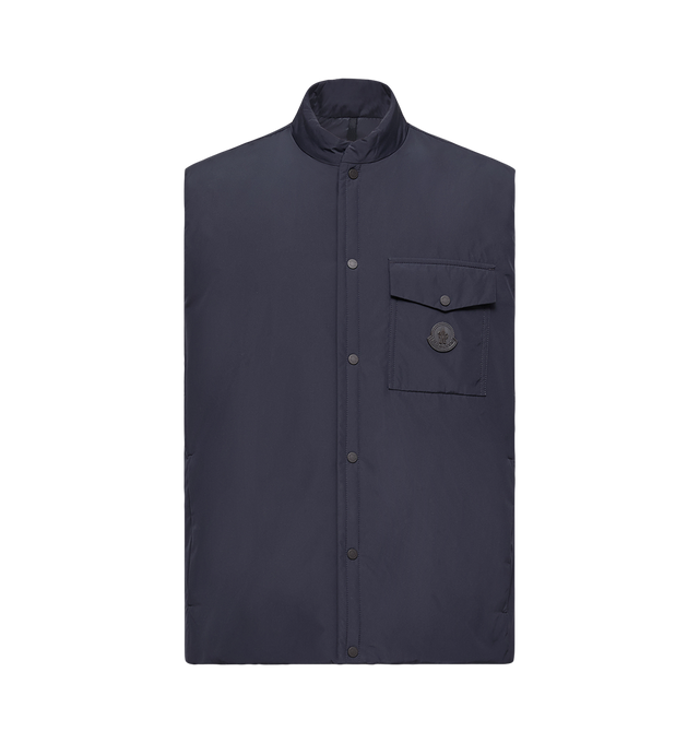 Image 1 of 1 - NAVY - MONCLER Sahel Down Vest featuring Aquaflect, water-repellent main fabric, AirSoft lining, down-filled, chest pocket with snap button closure, inner zipped pockets, pockets with snap button closure, tricolor trim and leather logo patch. 100% polyester. Padding: 90% down, 10% feather. 