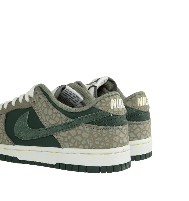 Image 3 of 5 - GREEN - NIKE Dunk Low Retro Premium featuring padded, low-cut collar, aged upper, foam midsole and rubber outsole with classic hoops pivot circle. 