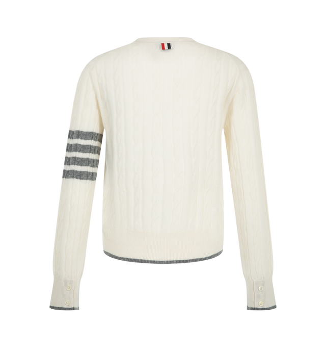Image 2 of 2 - WHITE - Thom Browne Women's Baby Cable Stitch V-Neck Cardigan is crafted from cashmere and features a baby cable-knit construction, a V-neck silhouette, and the brand's signature 4-Bar stripe detail. Main Material: Cashmere. Made in Italy. 