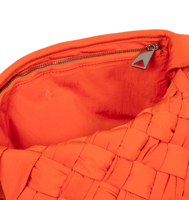 Image 3 of 3 - ORANGE - BOTTEGA VENETA Small Rumple Messenger featuring foulard intreccio, light paper nylon, cross-body bag with adjustable strap, single interior zipped pocket and magnetic closure. 5.5" x 8.3" x 2". Strap drop: 17.7". 100% polyester. Made in Italy. 