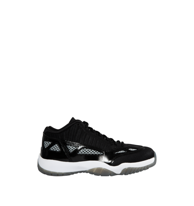BLACK - AIR JORDAN Jordan Retro 11 Low IE featuring leather and synthetic upper, full-length Air-Sole unit, composite shank in the midfoot and rubber sole with a circular traction pattern.