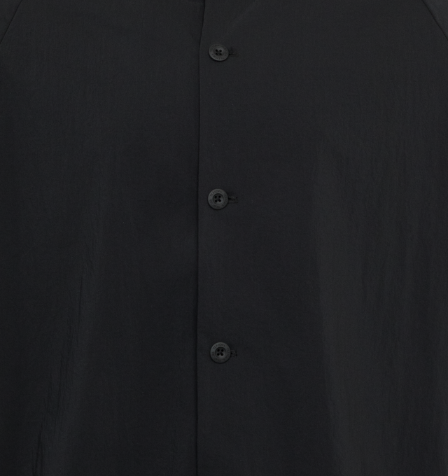 Image 3 of 3 - BLACK - Teatora Packable Wide Shirt has a classic collar, a button front closure, a curved hem, button cuffs, and it is crafted in quick-drying wrinkle-resistant fabrics. 100% nylon.  