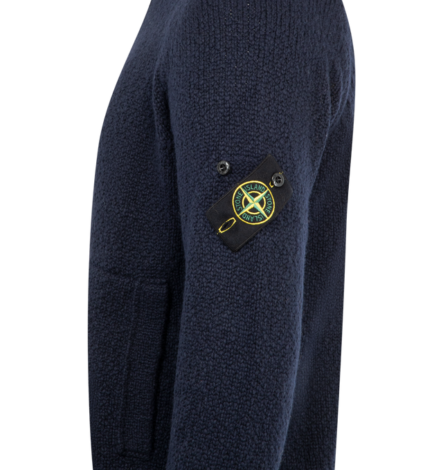 Image 3 of 3 - NAVY - STONE ISLAND Wool Cardigan featuring knit virgin wool-blend, rib-knit stand collar, hem, and cuffs, two-way zip closure, patch pockets at waist, raglan sleeves and detachable felted logo patch at sleeve. 48% virgin wool, 43% polyamide, 9% viscose.  
