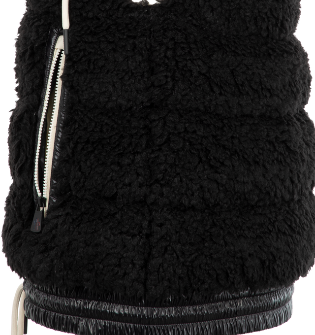 Image 3 of 3 - BLACK - MONCLER Padded Teddy Zip-Up Vest featuring teddy fleece, nylon laqu trim, nylon laqu lining, down-filled, adjustable hood, zipper closure, zipped pockets and hem with elastic drawstring fastening. 100% polyester. 100% polyamide/nylon. Padding: 90% down, 10% feather. 