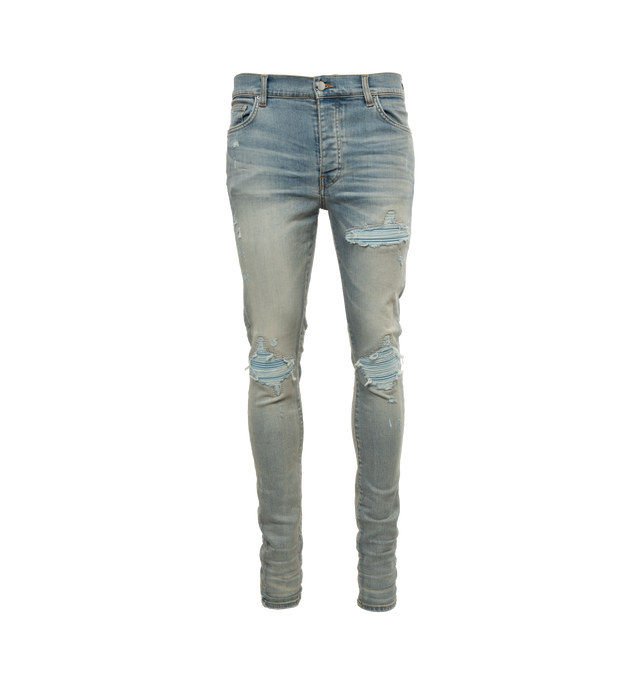 BLUE - AMIRI Mx1 Suede Jean featuring button fly, 5-pocket design, intentionally destroyed areas, light whiskering and fading detail. 92% cotton, 6% elastomultiester, 2% elastane. Made in USA.