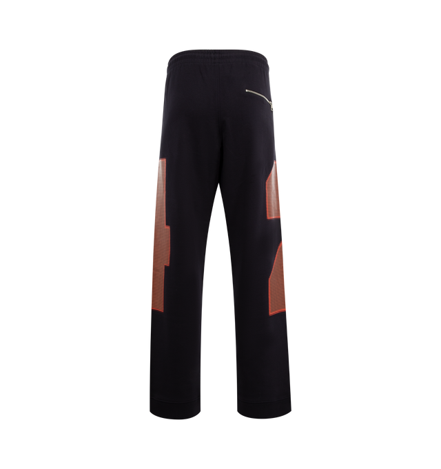 Image 2 of 3 - NAVY - DRIES VAN NOTEN Loose Sweatpants featuring placed print, loose fit, straight leg, side slit pockets and back zip pocket, rib hem borders and elasticated waistband. 100% cotton. 