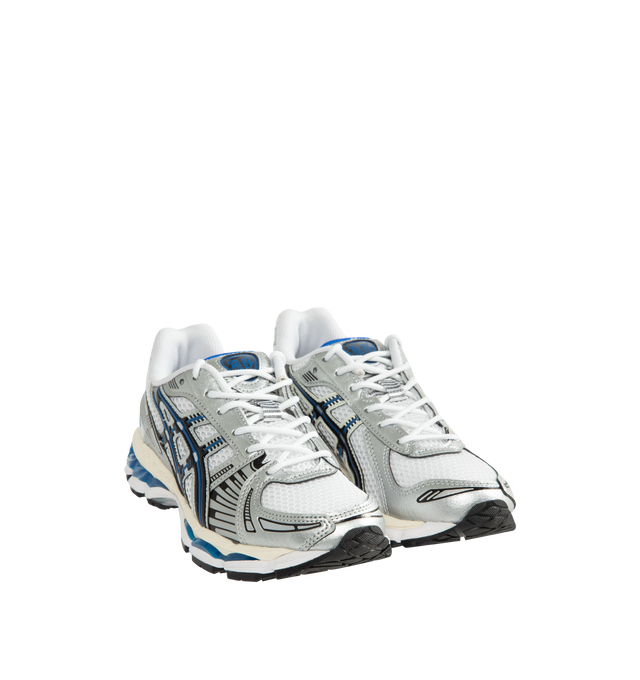 Image 2 of 5 - WHITE - Asics Unisex Gel-Kayano 12.1 Sneaker featuring breathable mesh underlays, GEL-NIMBUS17 tooling system, FLUIDRIDE technology, rearfoot and forefoot GEL technology and dope dyed recycled sockliner mesh.  