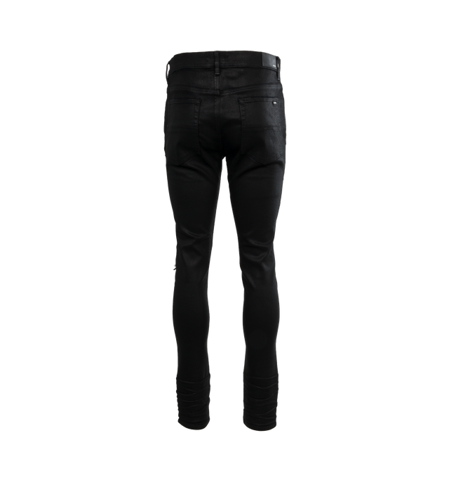 Image 2 of 4 - BLACK - AMIRI Wax MX1 Jeans featuring skinny-fit, waxed stretch denim jeans, distressing throughout, belt loops, five-pocket styling, button-fly, hand-distressed detailing at front, quilted grained leather underlay at legs, leather logo patch at back waistband and logo-engraved silver-tone hardware. 92% cotton, 6% elastomultiester, 2% elastane. Trim: 100% leather. Made in United States. 