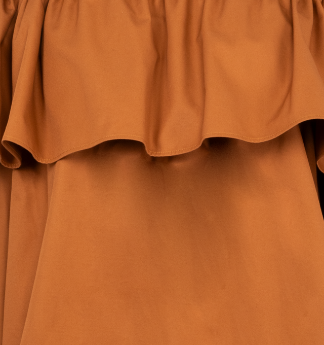 Image 3 of 3 - BROWN - Saint Laurent off-the-shoulder dress made with certified cotton, featuring an oversized ruffle neckline and hem, drawstring poet sleeves, and concealed pockets. 100% COTTON. Made in France. 