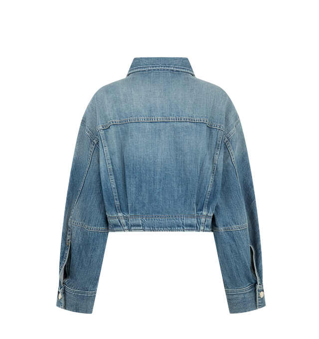 Image 2 of 3 - BLUE - Ruadh Women's Mhor Jacket is handcrafted from rigid regenerative cotton with a subtle cross-hatch texture that softens with wear for enhanced comfort. Designed with a bias-cut sleeve panel, this denim jacket creates an organic, flattering silhouette while maintaining a structured feel. Finished with the brand's signature semi-precious gold-tone hardware. Main Material: 100% Regenerative Cotton. Signature Gold-Tone Hardware. Made in USA. 