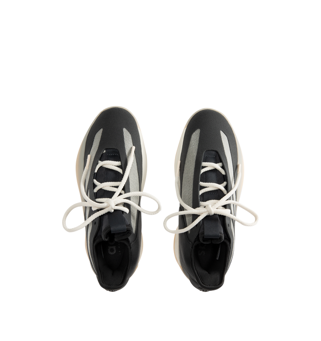 Image 5 of 5 - BLACK - ADIDAS Fear of God Athletics II Basketball Sneaker featuring synthetic upper, monofilament stripe panels, adidas branded TPU heel spoiler, TPU shank for spring and propulsion, lightstrike midsole, semi-translucent rubber outsole, adidas logo embossed on toe and Fear of God logo on black bar. 