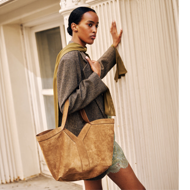 Image 4 of 4 - BROWN - SAINT LAURENT Y Small Tote in suede featuring small version of the Y tote in finely grained leather, ultra-lightweight bag, subtle Y signature stitching, lined in tonal leather, zip pocket, hook closure, one zip pocket and one keyring carabiner tab. 11.4" x 9.4" x 6.5". Calfskin. Made in Italy. 