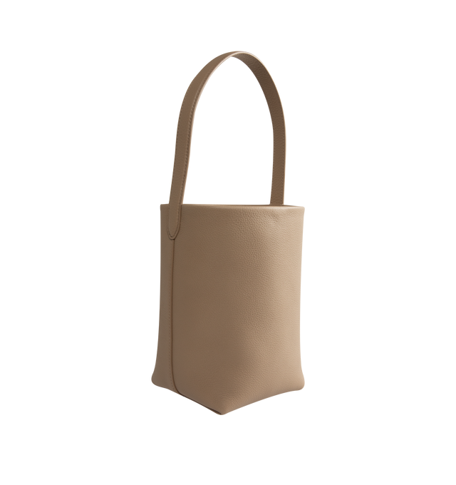 Image 2 of 3 - NEUTRAL - The Row Small N/S Park Tote featuring classic tote bag in grained calfskin leather with interior toggle closure and flat handle. 9.8 x 8.7 x 4.7 in. 100% leather. Lining: 100% suede. Made in Italy. 