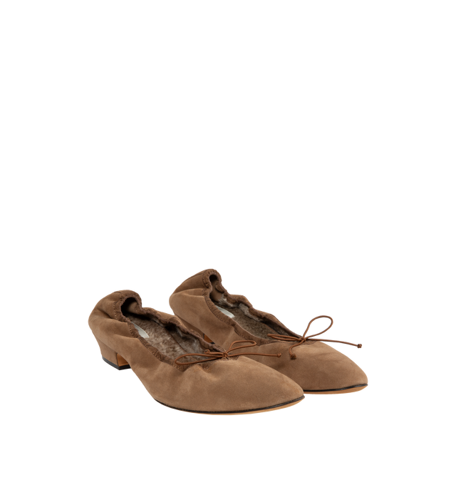 Image 2 of 4 - BROWN - THE ROW Awar Heeled Ballerina featuring heeled ballet flat in shearling-lined suede with oval toe, grosgrain piping, and adjustable elastic tie. 1 in. heel. 100% goatskin leather. Leather sole. Made in Italy. 