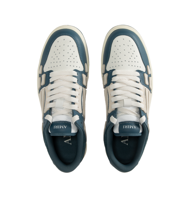 Image 5 of 5 - BLUE - Amiri Men's Quad Skel Top Low Sneakers are a lace-up style with perforation details, signature graphics, leather appliques, and two-tone rubber soles. Leather uppers. Made in Vietnam. 