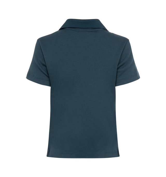 Image 2 of 2 - NAVY - Nike X Yoon women's short sleeve polo top in midweight fabric with a bit of texture and stretch to give you a body-skimming fit with a comfortable feel. Featuring woven Yoon Ahn label, ribbed collar with sport taping. 97% polyester/3% spandex. 