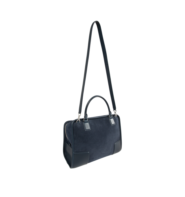 Image 4 of 5 - NAVY - LOEWE Large Amazona 180 Bag in suede featuring a relaxed silhouette anchored by a single toron top handle, designed to be carried open while a concealed closure secures the main compartment, removable shoulder and crossbody straps, zip closure with two leather zip pullers, two compartments, main compartment closed with magnetic closure, internal flat pocket, left side d-ring for customization, suede and nappa lambskin lining, embossed LOEWE and embossed double L branding. Suede/calf. 2 