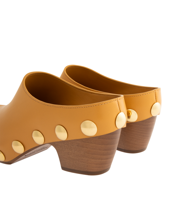 Image 3 of 4 - YELLOW - BOTTEGA VENETA Gondola Clog featuring shiny calf leather with metal stud detailing and beech wood platform. Lining: Calfskin. Lugged rubber outsole. Made in Italy. 