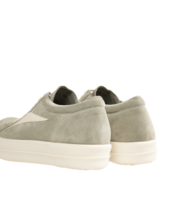 Image 3 of 5 - NEUTRAL - Rick Owens Mens Vintage Sneakers feature a full-grain calf leather and suede upper. Designed with an under-ankle silhouette, eight-eyelet lace-up closure, toe cap, resized triangular leather side appliqu, padded ankle, contrast stitching, and shark-tooth thermoplastic rubber outsole. Upper: 100% Cow Leather; Lateral Details: 100% Calf Leather; Lining: 100% Calf Leather; Insole: 100% Calf Leather; Outsole: 100% Thermoplastic Rubber. Sole Height: 3.5 cm. Made in Italy. 
