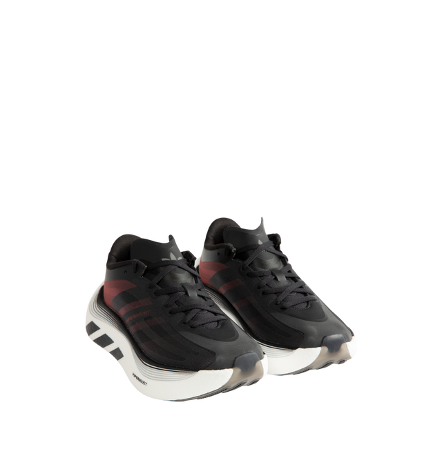 Image 2 of 5 - BLACK - Adidas Hyperboost EPHR LT Sneakers feature a semi-transparent mono mesh upper that showcases the internal exoskeleton for a lightweight feel, enhanced breathability, and a modern aesthetic. This designer sneaker combines innovative construction with everyday comfort and performance. Main Material: Mesh and Synthetic. 