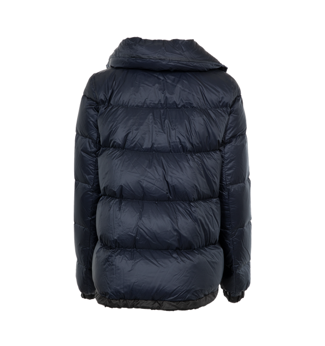 Image 2 of 3 - NAVY - SACAI Short Puffer Jacket featuring quilted nylon, stand collar, snap placket front, long sleeves, chest flap pockets, drawstring waist and hem and a-line silhouette. Nylon/polyester combo. Fill: down/feather. 