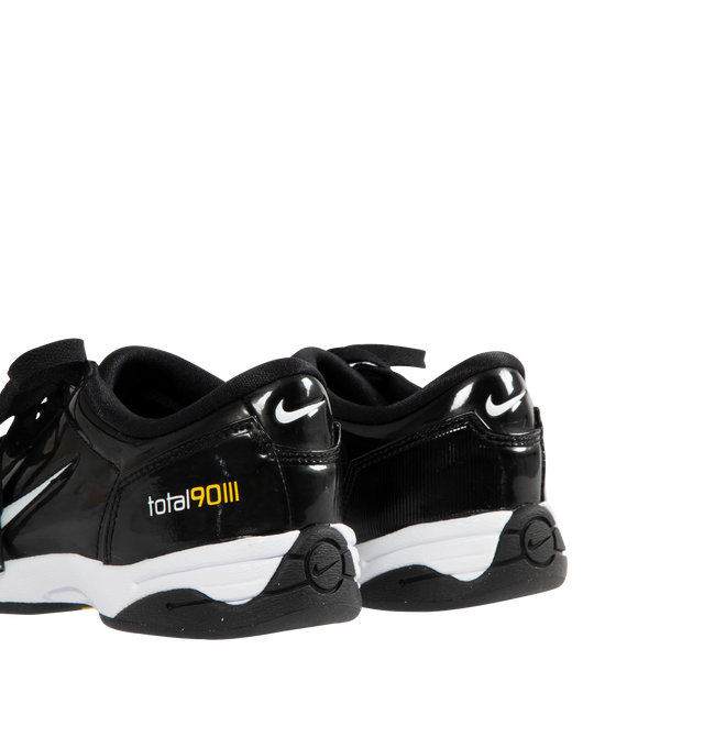 Image 3 of 5 - BLACK - NIKE T90 SP Sneaker featuring authentic soccer style, flat rubber sole, quilted upper, asymmetrical lacing, glossy black and white finish combines with Tour Yellow and Metallic Silver. 