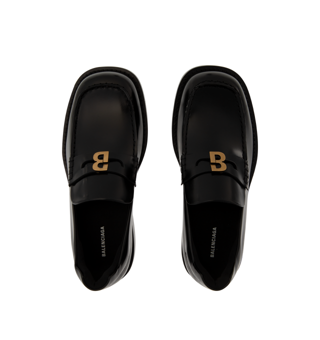 Image 4 of 4 - BLACK - Balenciaga Womens Comfy Loafers are crafted from smooth moka leather. Feature a slip-on silhouette, round toe, metallic detail across the vamp, thick sole, and leather construction designed to develop a natural patina over time. Main Material: Leather; Sole: Leather. Made in Italy. 
