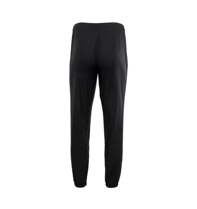 Image 2 of 4 - BLACK - ADIDAS JJJJound Nylon Track Pants featuring regular fit, drawcord on elastic waist, side pockets and ribbed cuffs. 100% recycled nylon plain weave.  