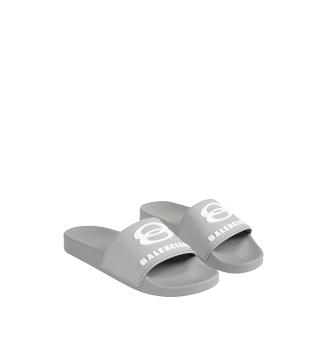 Image 2 of 4 - GREY - BALENCIAGA Pool Slide Sandal featuring molded rubber footbeds, unity sports icon artwork on the strap and tone-on-tone sole and insole. Upper: polyurethane. Sole: EVA. Made in Italy. 