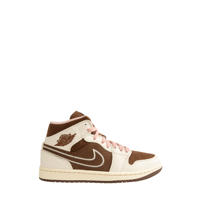 Image 1 of 5 - BROWN - Air Jordan 1 Mid Women's Shoes feature the iconic basketball-inspired silhouette and combine premium comfort with everyday wearability. Crafted with a durable leather upper, this classic style is equipped with an encapsulated Nike Air-Sole unit and a foam midsole for lightweight cushioning, while a rubber outsole provides reliable traction. Finished with a padded collar and traditional lace-up closure, the AJ1 Mid delivers timeless Jordan heritage with lasting support. Main Material:  