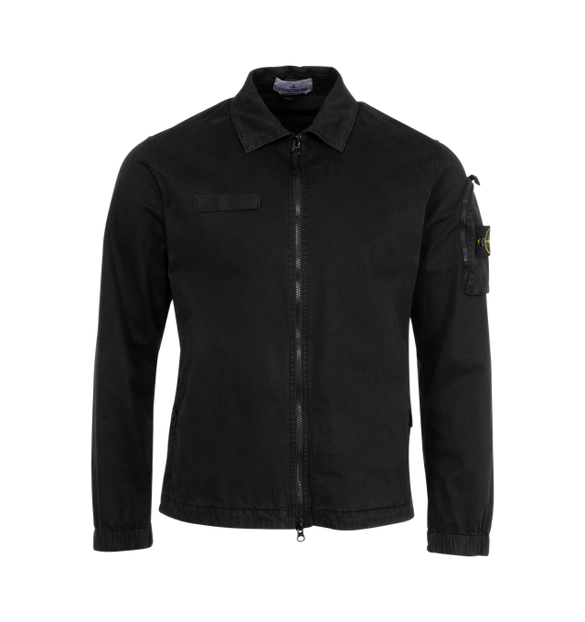 Image 1 of 3 - BLACK - Stone Island Stretch Broken Twill Overshirt has a spread collar, a zip front closure, side pockets, a zipper sleeve pocket, a brand logo badge, snaps at the cuffs, and a back yoke. 98% cotton, 2% elastane/spandex. Made in Romania.  