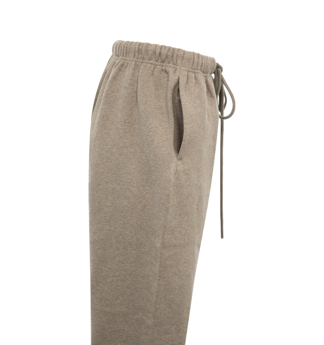 Image 3 of 3 - GREY - FEAR OF GOD ESSENTIALS Sweatpants featuring drawstring waist, elastic waist and hem, side pockets and logo on front. 100% cotton.  