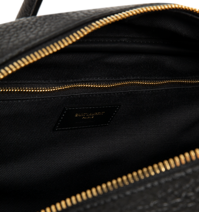 Image 3 of 3 - BLACK - SAINT LAURENT Sac De Jour Boston Bag in grained leather featuring elongated straps, cotton and linen lining, bronze-tone hardware, zip closure and two zip pockets. 16.1" x 9.8" x 7.58.9". Handle drop: 7.1". Calfksin. Made in Italy. 