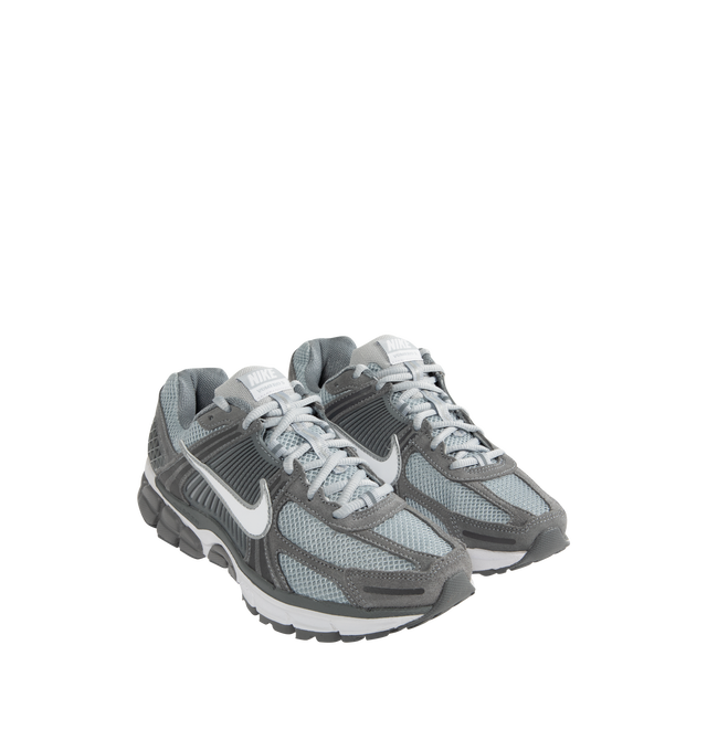 Image 2 of 5 - GREY - NIKE Zoom Vomero 5 Sneaker featuring upper with real and synthetic leather for a layered, mesh panels and ventilation ports on the heel, Zoom Air cushioning, plastic caging on the side, rubber outsole and reflective details. 