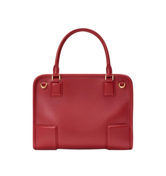 Image 8 of 18 - RED - Loewe Small Amazona 180 Bag in leather features a relaxed silhouette anchored by a single toron top handle, designed to be carried open, while a concealed closure secures the main compartment, three carry options: short handle, removable shoulder strap and crossbody, zip closure with two leather zip pullers, two compartments, main compartment closed with magnetic closure, internal flat pocket, left side d-ring for customization, nappa lambskin lining, and embossed double L branding. Le 