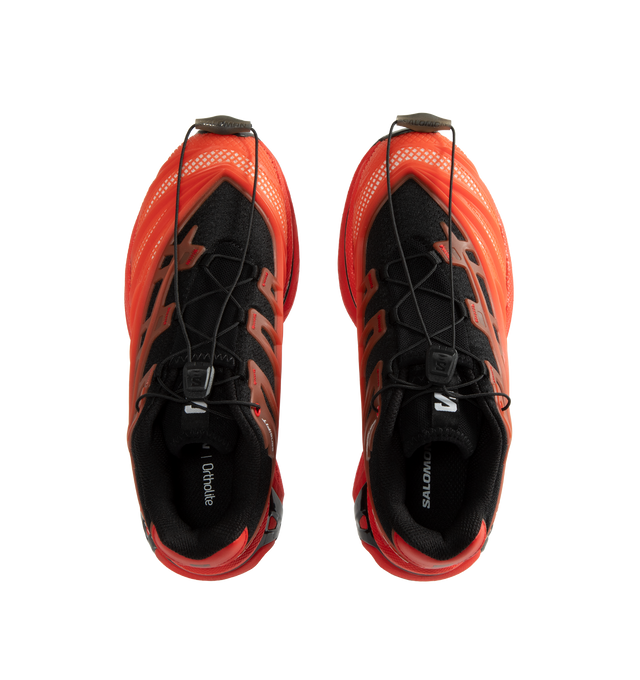 Image 5 of 5 - RED - Salomon XT-EVO Sneakers are crafted from synthetic and textile materials and feature an evolved XT silhouette inspired by competitive trail running and exploration. Defined by sharp, aggressive lines and a race-ready aesthetic, this performance-driven style combines lightweight construction with Salomon's signature Quicklace system for a secure fit. Finished with a textile lining, textile insole, and durable rubber outsole, the XT-EVO delivers comfort, support, and traction for everyday 