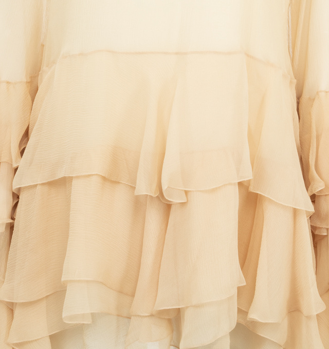 Image 3 of 3 - NEUTRAL - Ruffled mini dress in organic silk mousseline with a separate dress lining, featuring maxi sleeves and drawstring ties detailed with hammered pearl and gold-toned banana tips. 100% organic silk with silk lining. 