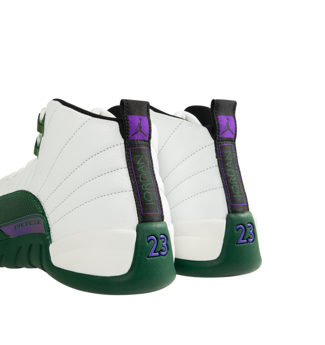Image 3 of 5 - GREEN - Air Jordan 12 Retro 'Bucks' Sneakers are crafted from premium leather and feature a Summit White upper with sunrise-inspired stitch lines and Gorge Green overlays inspired by early-2000s player exclusives. Designed with a classic basketball silhouette, they are finished with Jumpman branding, Air Zoom cushioning, and a durable rubber outsole for comfort and performance. Main Material: Leather. Cushioning: Full-length Air Zoom. Sole: Rubber. Made for men. 