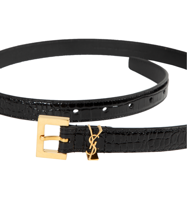 Image 2 of 2 - BLACK - Saint Laurent Cassandre thin belt crafted from croc embossed calfskin leather with gold-tone hardware and Cassandre adorned belt loop. Measures 0.7 inches wide with adjustable length. Made in Italy.  