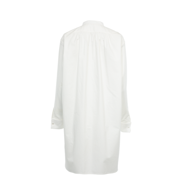 Image 2 of 3 - WHITE - THE ROW Hari Cotton Longline Shirt featuring band collar, long sleeves, button cuffs and button-front placket. 100% cotton. Made in Italy. 
