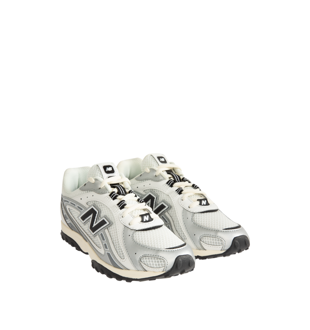 Image 2 of 5 - GREY - New Balance Mens 204L Sneakers feature a low-profile silhouette with a synthetic upper, embossed overlays, screen-printed saddle graphics, and double-stacked suede "N" logo. Designed with an EVA outsole and a distinctive tread pattern inspired by 2000s running shoes and 1970s heritage styles. Upper: Synthetic with Suede Details; Outsole: EVA. Made in Indonesia. 