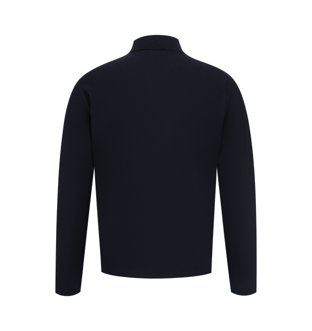 Image 2 of 2 - NAVY - THE ROW Bertram Top featuring long-sleeved polo top in lightweight cashmere with clean edge finish and horn button closure. 100% cashmere. Made in Italy. 
