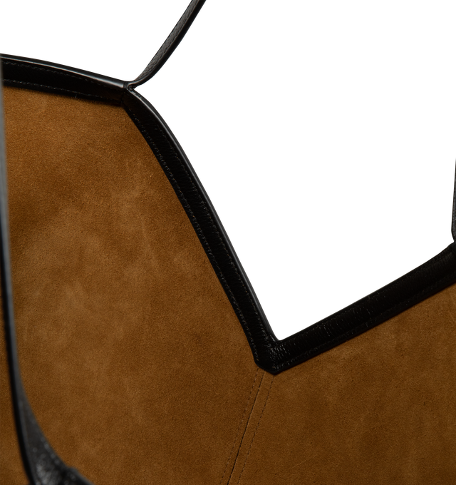 Image 3 of 3 - BLACK - SAINT LAURENT Y Slim Tote Bag featuring finely grained calfskin leather, bronze-tone hardware, stitched Y signature, dual top handles; 10.8" drop, open top and interior, one zip pocket and one keyring carabiner tab. 23.6"W x 13.4"H x 7.5"D. Made in Italy. 