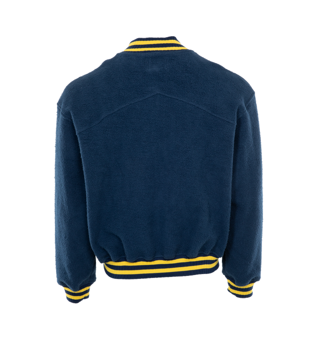 Image 2 of 3 - NAVY - RHUDE Oversized Logo Terry Varsity Jacket featuring oversized fit, varsity logo at front, striped rib-knit collar, cuffs and waistband, zip front closure, sropped shoulders and long sleeves. Made in USA. 