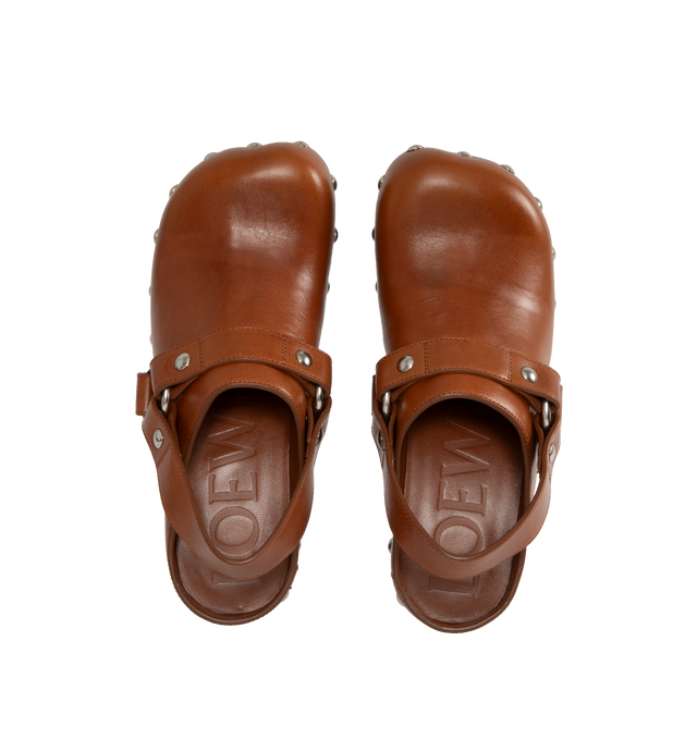 Image 4 of 4 - BROWN - LOEWE Clog in vegetal-tanned calfskin with a chunky monoblock sole and all around studs on the upper, a slingback strap and slanted heel. Featuring 70mm heel with lasered Anagram on the back of the heel, leather insole and outsole. Made in Italy. 