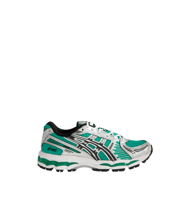 Image 1 of 5 - GREEN - Asics Men's Gel-Kayano 12.1 Sneaker featuring breathable mesh underlays, GEL-NIMBUS17 tooling system, FLUIDRIDE technology, rearfoot and forefoot GEL technology and dope dyed recycled sockliner mesh. Imported from Vietnam. 