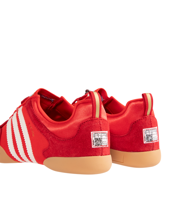 Image 3 of 5 - RED - Adidas Mens Originals x Bad Bunny Ballerina Sneakers are crafted from canvas and suede. Features a low-cut silhouette, lace-up closure with bungee-cord laces, signature 3-Stripes, "Benito" branding, adidas para Bad Bunny detailing, heel pull tab, textile lining, and gum rubber outsole. Upper: Canvas and Suede; Lining: Textile; Outsole: Rubber. Made in Vietnam. 